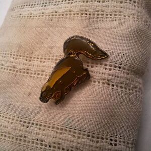 Striped skunk vintage Logo pin